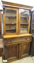 19th Century mahogany secretaire bookcase having moulded cornice above two arched top glazed doors