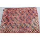Small Afghan carpet with three rows of seven gols on a rose ground with borders, 260 x 204cm (some
