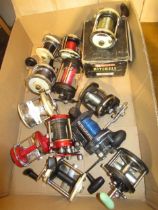 Mitchell 600A multiplier reel in original box, together with a quantity of other multiplier reels by