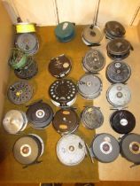 Three Mitchell fly reels, together with a quantity of other various fly reels by other makers