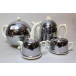 Mid 20th Century Heatmaster pottery four piece tea service with chromium heat covers