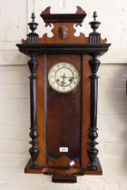 Late 19th Century Continental walnut and ebonised Vienna style wall clock, the enamel dial with