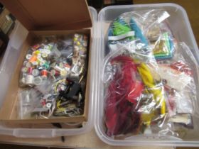 Two boxes containing a large quantity of various fly fishing materials, including feathers, hooks