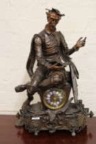 19th Century Continental patinated spelter mantel clock surmounted by a seated figure of Don