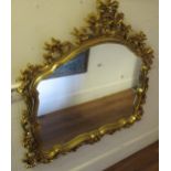 Reproduction gilt framed overmantel mirror with pierced surround, 120cm wide approximately, together
