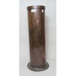Art Nouveau hand beaten cylindrical copper stick stand with embossed decoration, 62cm high x 22cm