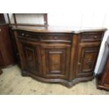 Reproduction walnut and figured walnut serpentine shaped sideboard in 19th Century style, 187cm wide