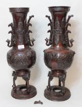 Pair of late 19th / early 20th Century Japanese dark patinated bronze two handled baluster form