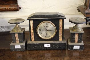 19th Century Continental black slate and rouge marble mounted three piece clock garniture, the
