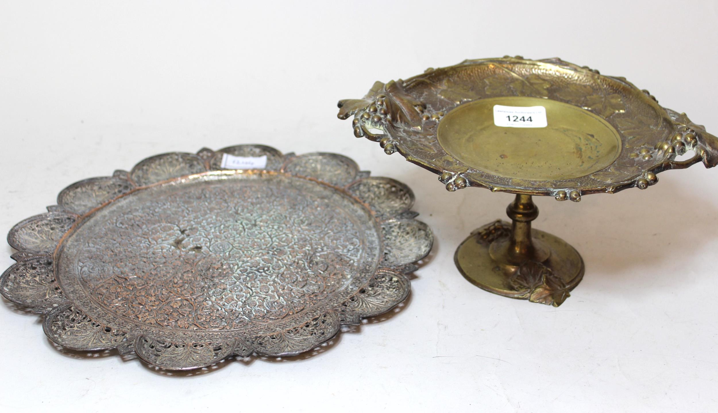 19th Century brass pedestal tazza with a grape leaf design and side handles, 27cm wide overall,