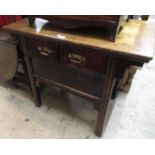 Chinese stained elm altar table with two short drawers on splay supports, 88cm high, 102cm wide,