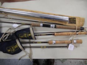Three Hardy Fibalite rods with original bags, together with a Hardy rod tube, in original bag