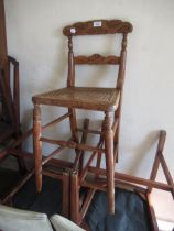 Child's Regency beechwood correction chair with cane seat, late 19th Century walnut open armchair
