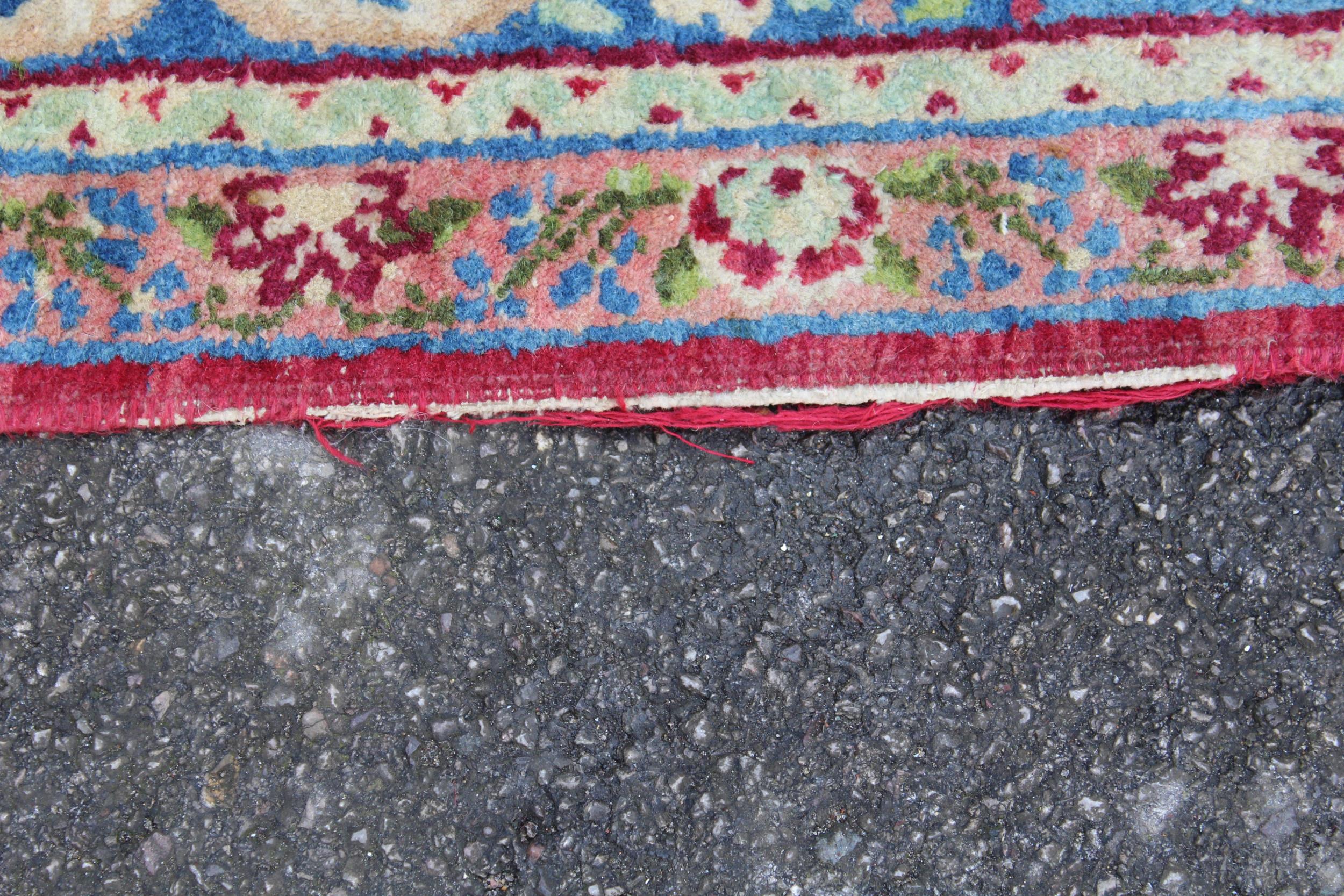 Pair of Indian rugs with a lobed medallion design on a wine ground with borders, 223 x 143cm each - Image 5 of 6