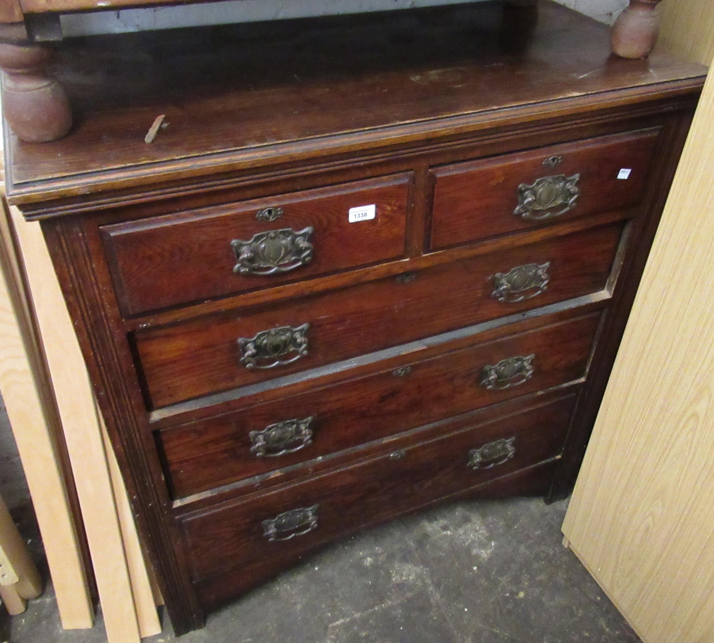 Edwardian oak straight front chest of two short and three long graduated drawers, with Art Nouveau