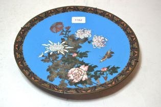 Japanese circular cloisonne wall plate, decorated with a butterfly and flowers, 12ins diameter