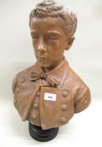 19th Century painted plaster bust of a young boy wearing bow tie and dress uniform on an ebonised