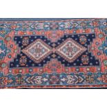 Pair of North African rugs of twin medallion Persian design, 165 x 86cm