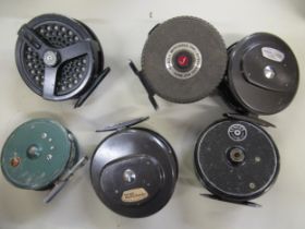 Mitchell fly reel, together with two Intrepid Rimfly reels and three others