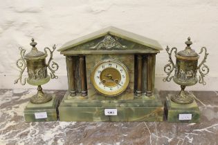 French green onyx gilt metal mounted clock garniture, the gilded and ceramic dial with Arabic