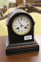 19th Century black slate and rouge marble two train mantel clock, together with an Edwardian brass