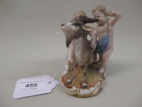 Meissen group of two putti with a goat, 9.5cm high Various areas of restoration to hands, goat's