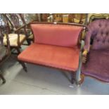 Small Victorian mahogany two seat drawing room sofa, the shaped padded back above an overstuffed