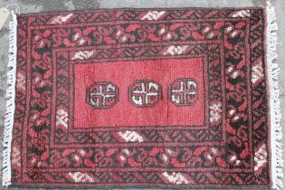 Two small Afghan mats, 70 x 50cm approximately