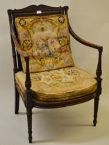 Late 19th Century mahogany open armchair in George III style, having cane back and seat with