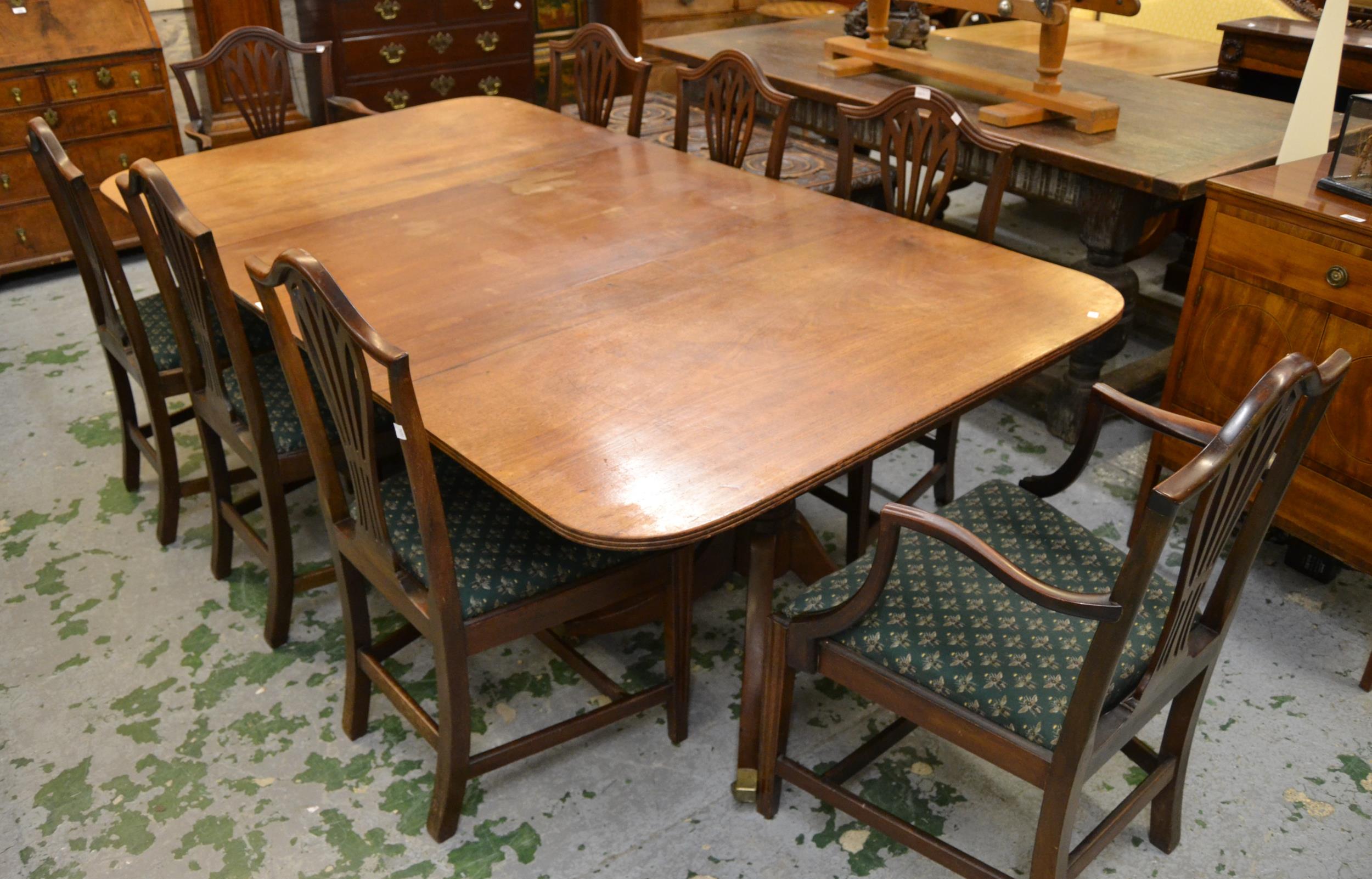 19th Century mahogany twin pedestal dining table with a single extra leaf, the reeded top above ring - Image 2 of 3