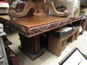 French Art Deco dining table, the rectangular top raised on shaped supports with vine design metal