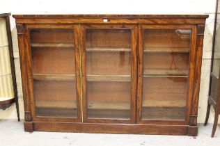 Good quality Victorian figured mahogany dwarf bookcase, the moulded top above three rectangular