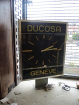 Mid 20th Century double sided polished aluminium and steel cased Ducosa, Geneve, clock with mount,