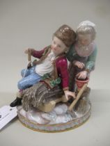Meissen figural group allegorical of Winter with a boy and girl beside a sledge, 14.5cm high (slight