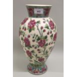 Zsolnay red rose decorated baluster form vase, 36cm high Restoration around rim. Various areas of