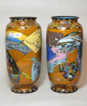 Pair of large Japanese cloisonne baluster form vases decorated with panels of birds, butterflies and