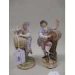 Near pair of Meissen figures of a man and woman each drawing wine from a barrel, 17.5 x 17cm high (