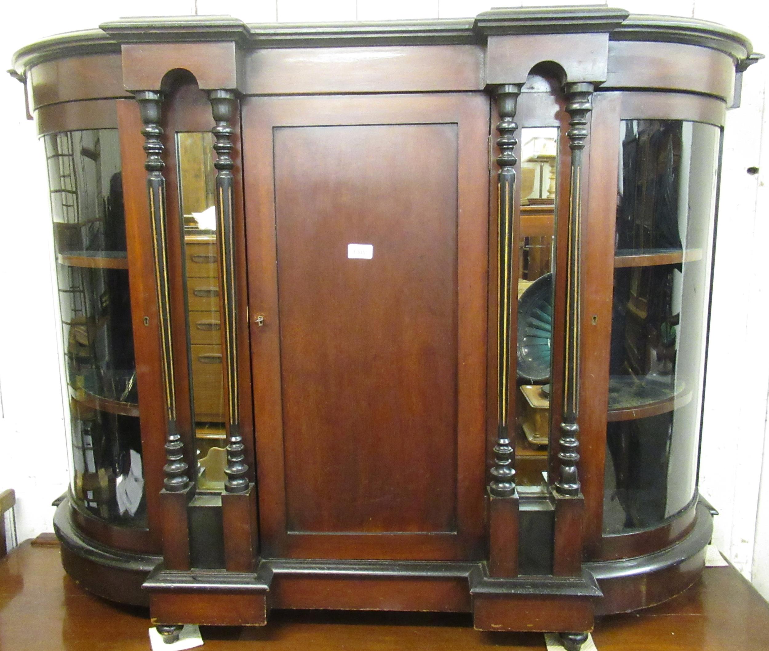 Victorian mahogany credenza with central panelled door enclosing shelves, flanked by clear glazed