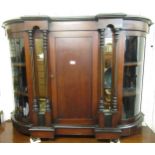 Victorian mahogany credenza with central panelled door enclosing shelves, flanked by clear glazed