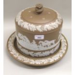19th Century brown Jasperware Stilton stand and cover, relief decorated with oak leaves and a