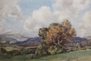 Herbert Hughes Stanton, watercolour, an extensive hilly landscape with figure to the foreground,