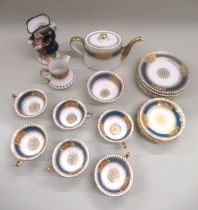 Pointon's porcelain tea service, together with a Staffordshire pottery Toby jug