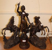 Patinated spelter figure of a standing female, 57cm together with a pair of dark patinated spelter