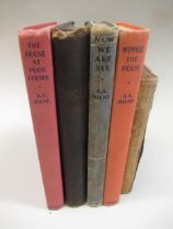 Three Winnie the Pooh books together with a Gulliver's travels and Uncle Remus