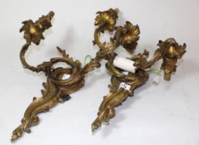 Pair of French ormolu rococo style two branch wall lights