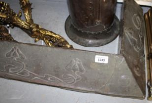 Art Nouveau copper covered fire curb, 142cm wide and an iron and brass fireside iron holder