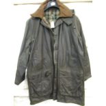 Barbour Border jacket, together with a Barbour wading jacket Various areas of wear, scuffs and