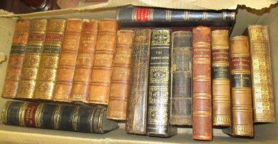 Three boxes containing a large quantity of miscellaneous leather bound books