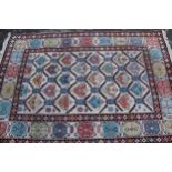 Modern Turkish rug of Shirvan design with an all-over stylised flowerhead pattern in pastel shades