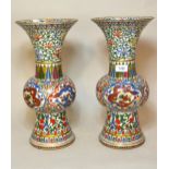 Pair of large Chinese cloisonne baluster form flared rim vases, with dragon and floral decoration,